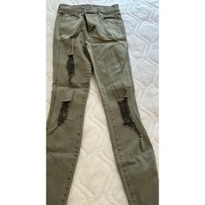 Women's green frayed Level 99‎  skinny jeans size 24